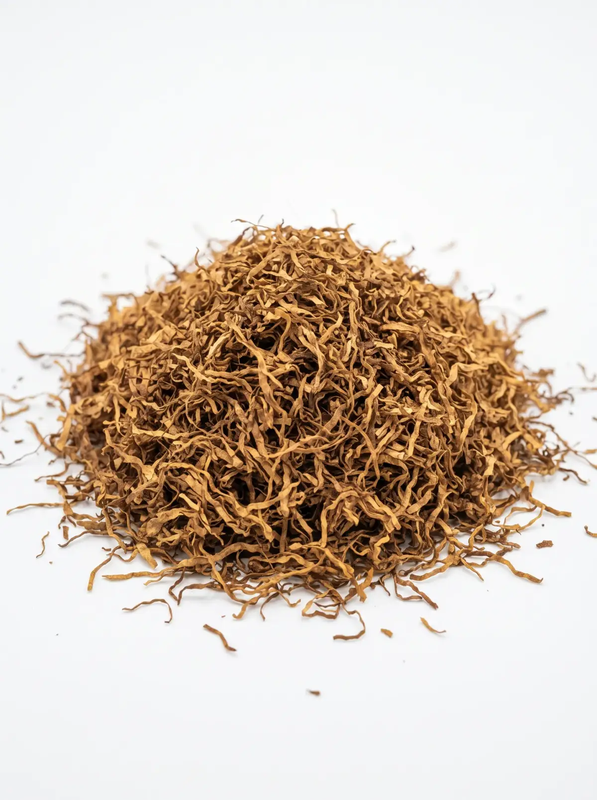 A mound of fine cut rag tobacco on a white background