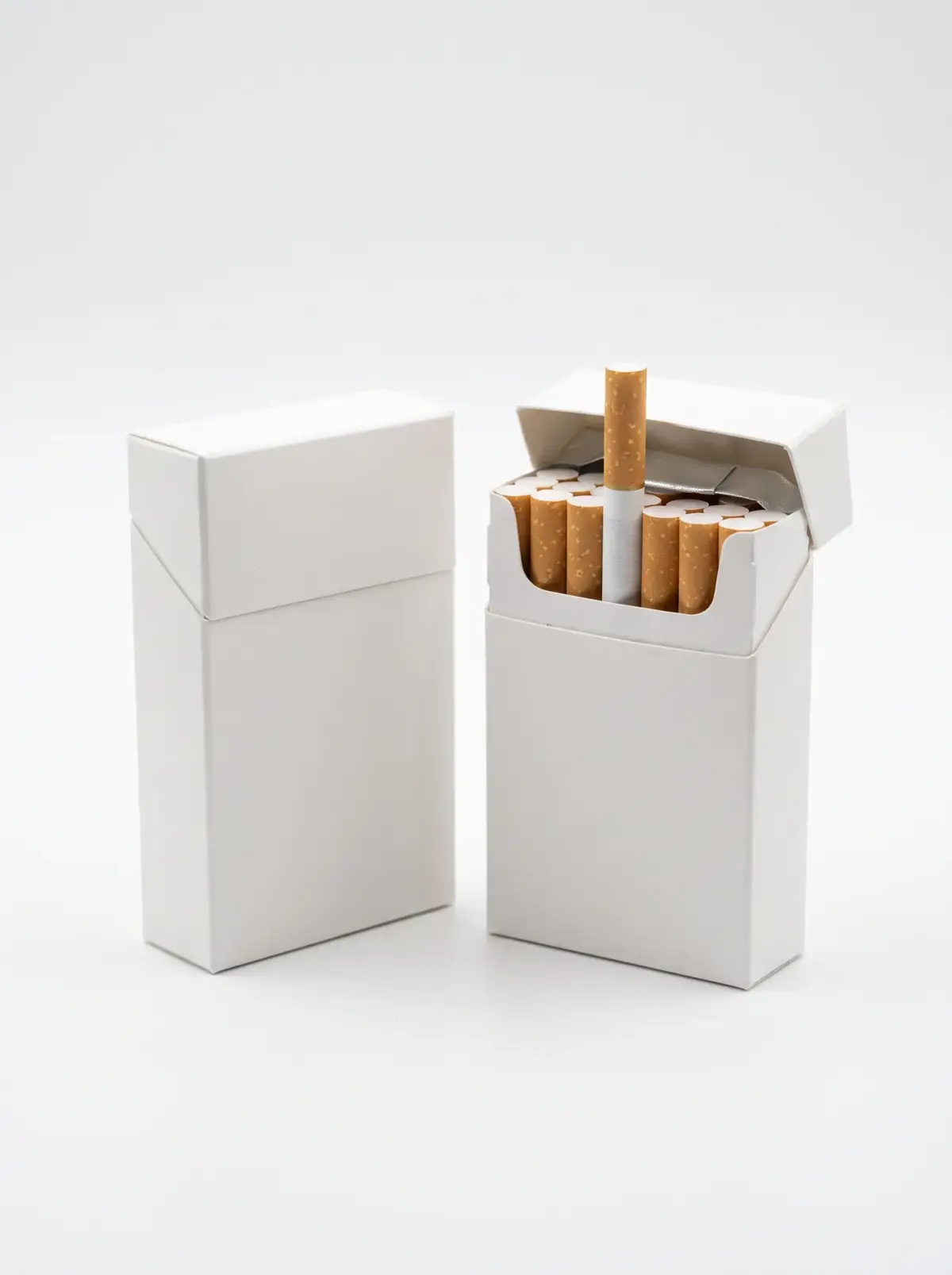Two plain white king-size cigarette packs, one open showing filter cigarettes