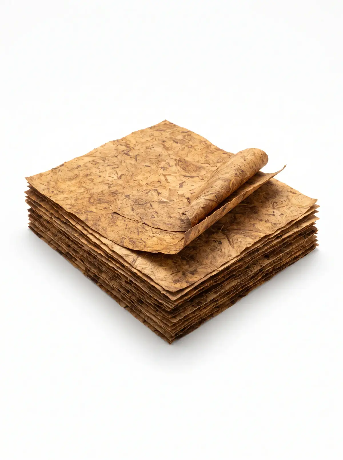 A stack of reconstituted tobacco sheets on a white background